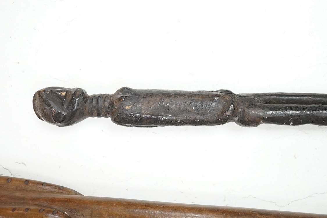Tribal interest: Three carved hardwood African staffs, longest 148.5cm. Condition - good considering use and age